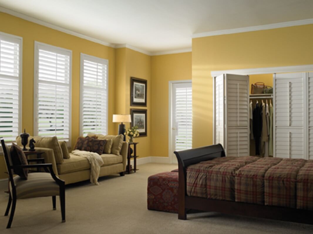 Faux wood shutters installed in Spring TX