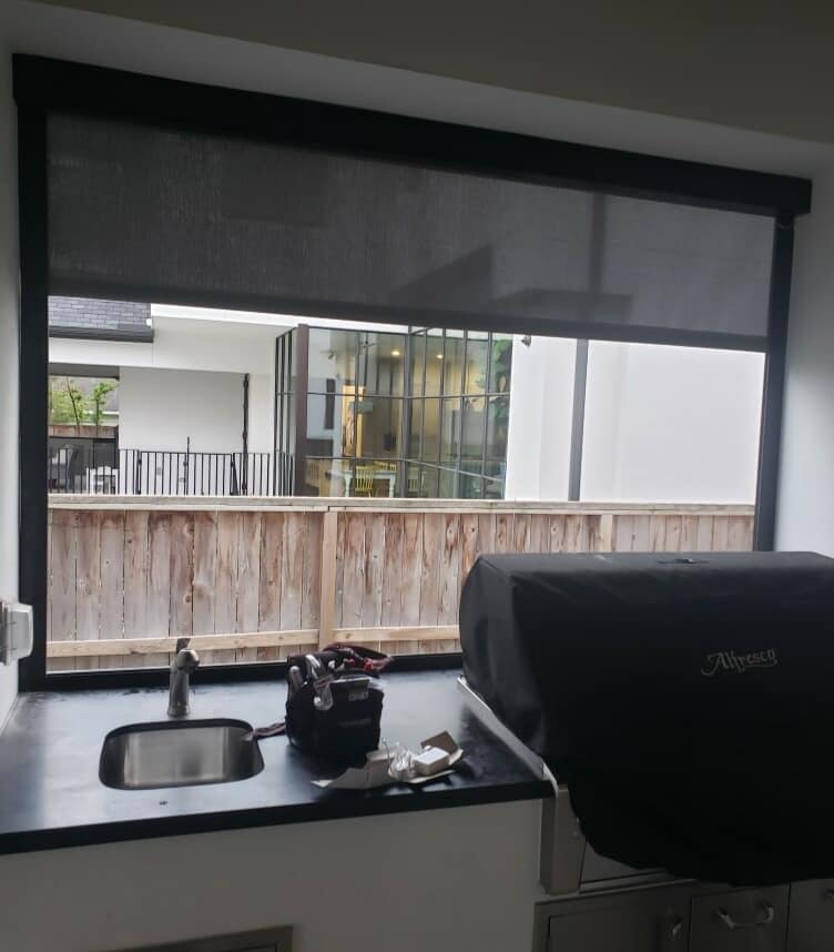 Patio roller shades installed in Houston TX